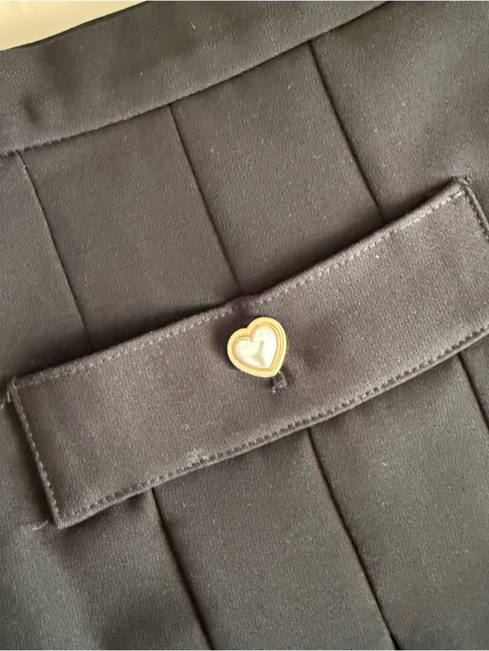 Black Pleated Mini Skirt with Pearl Heart Buttons - Picture 6 of 11